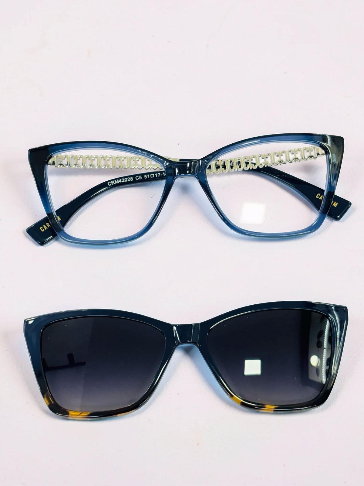 Side view of blue cat-eye optical frame with gold-tone temples
