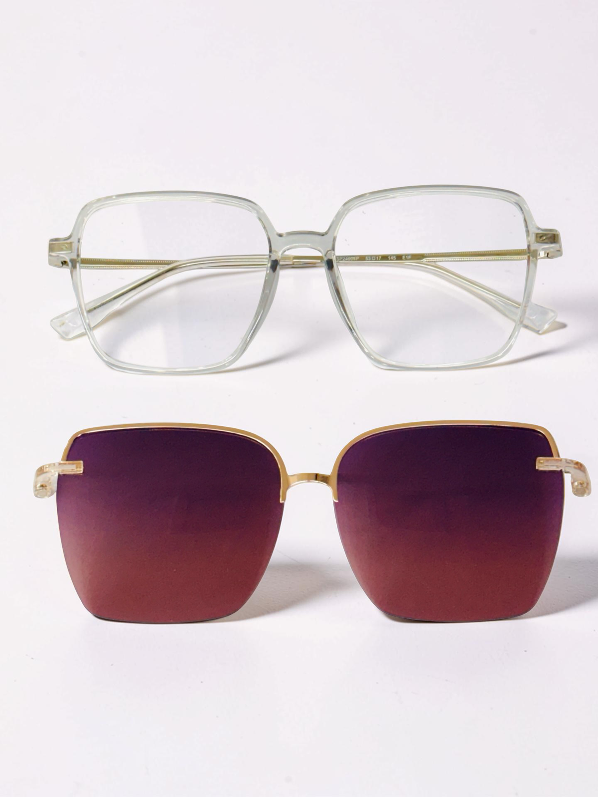 Angled view of transparent geometric frame and gold-tone temples