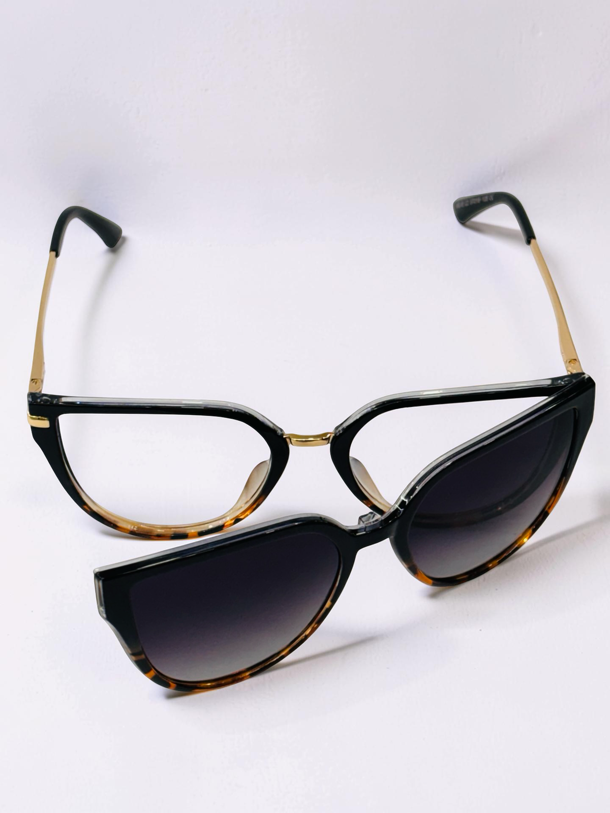 Front view with matching dark gradient sunglass clip attached