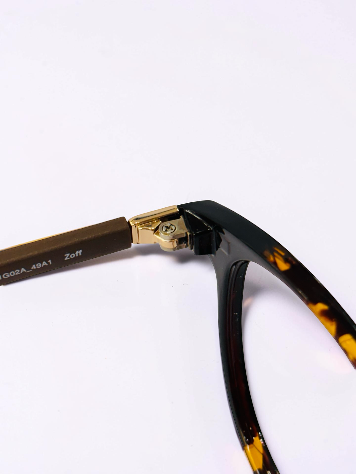 Front view of black and tortoiseshell eyeglasses