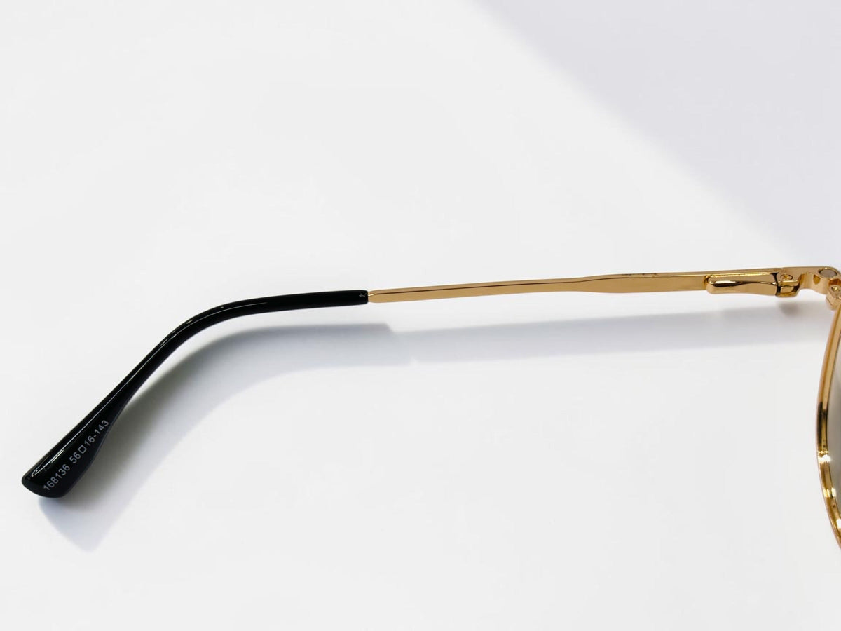 Front view of gold-tone aviator optical frame