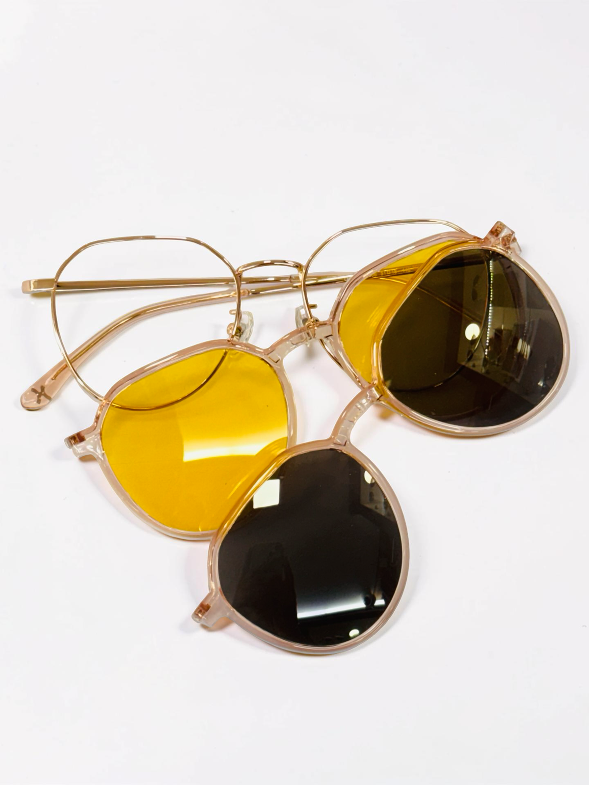 Gold geometric clip-on frame angled view with clear lenses