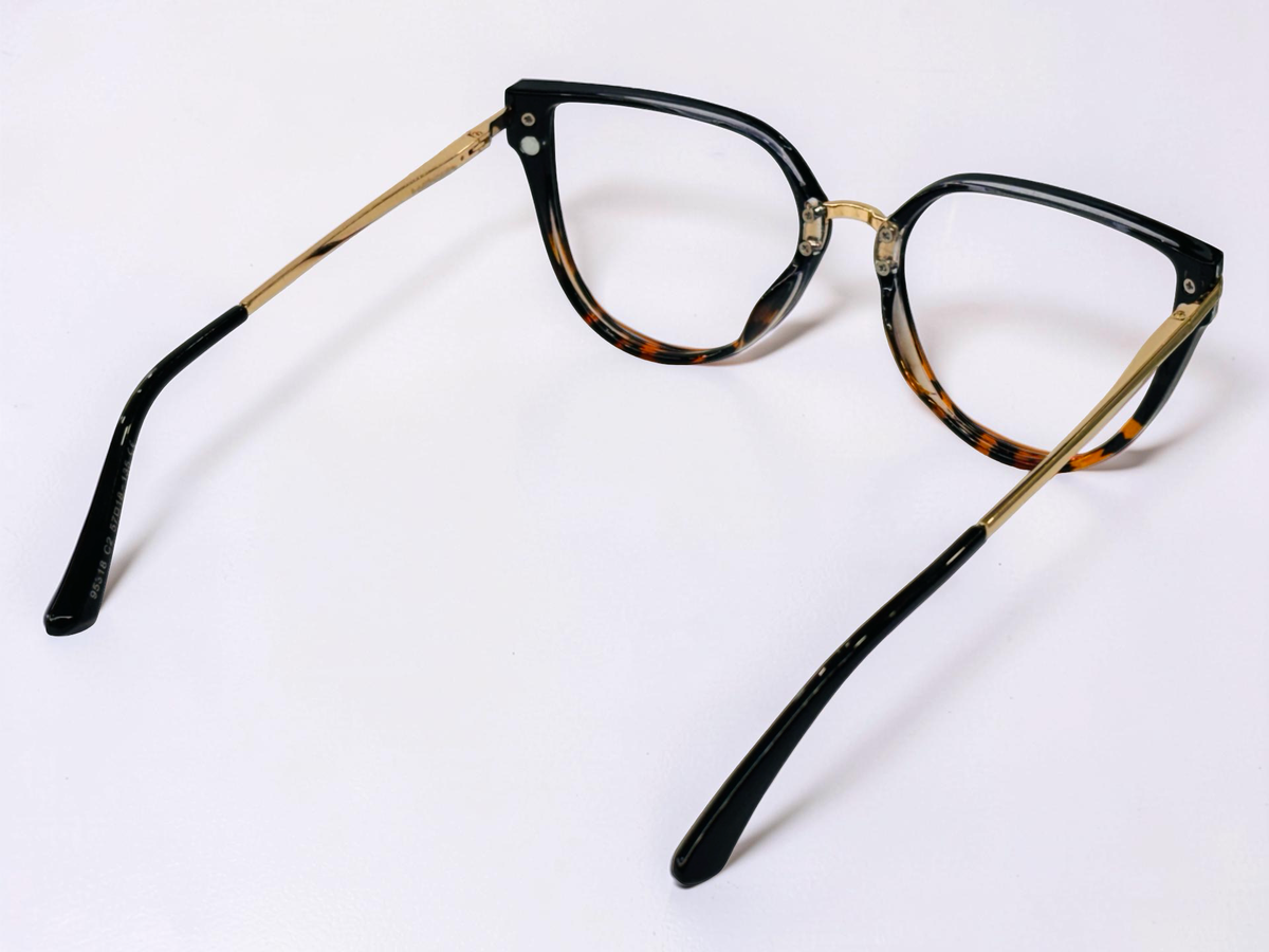 Optical frame with matching sunglass clip shown beside it