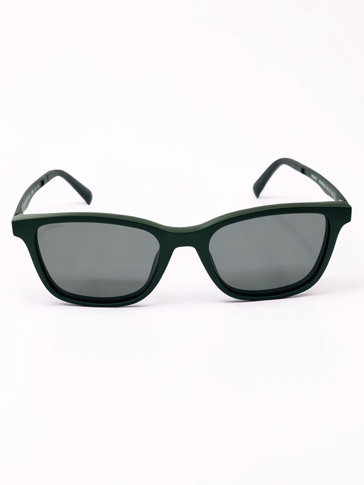 Detachable polarized clip beside olive green frame