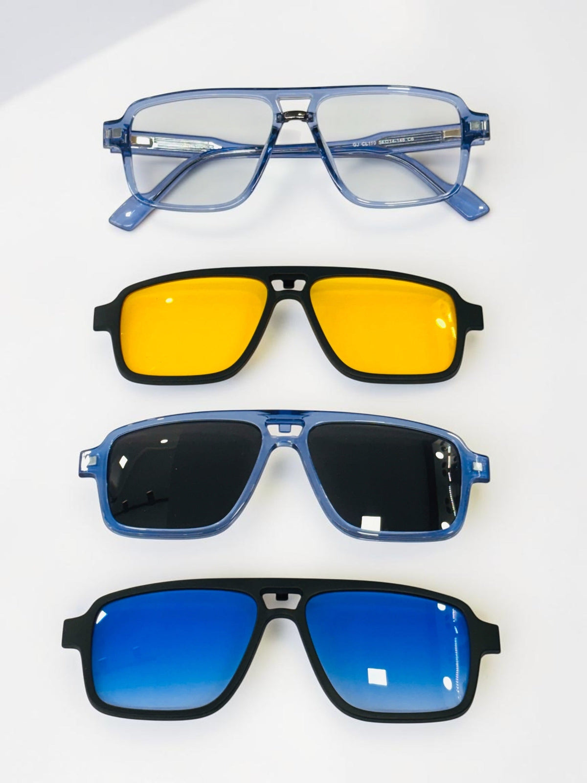 Angled view of the translucent blue square-aviator frame with clear lenses