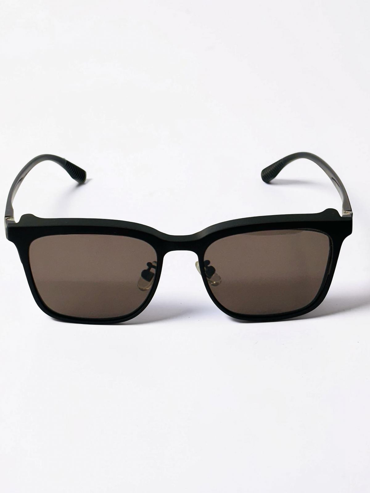 Front view of black frame with clip-on lens