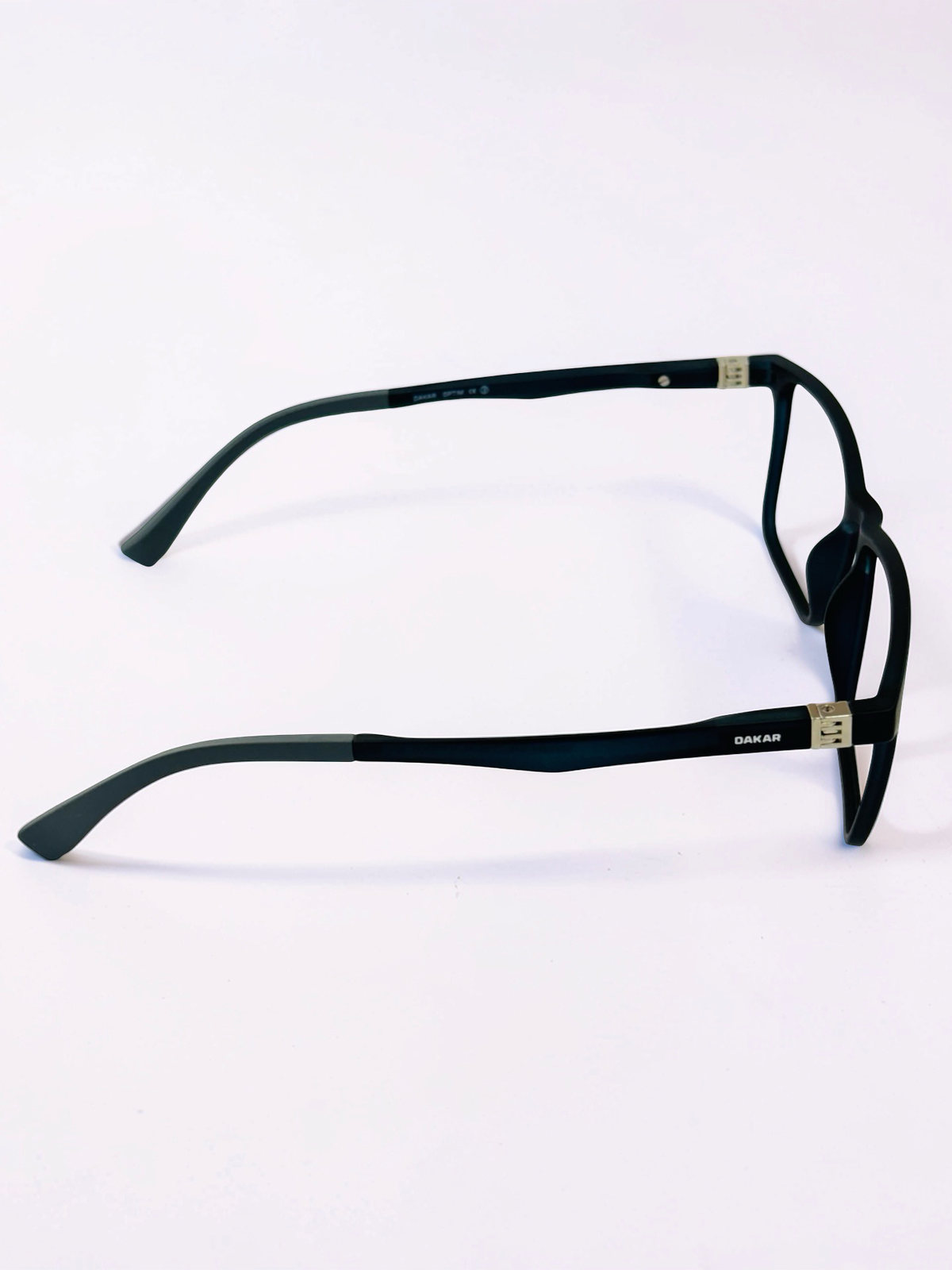 Black square frame, side profile with Dakar branding on temple