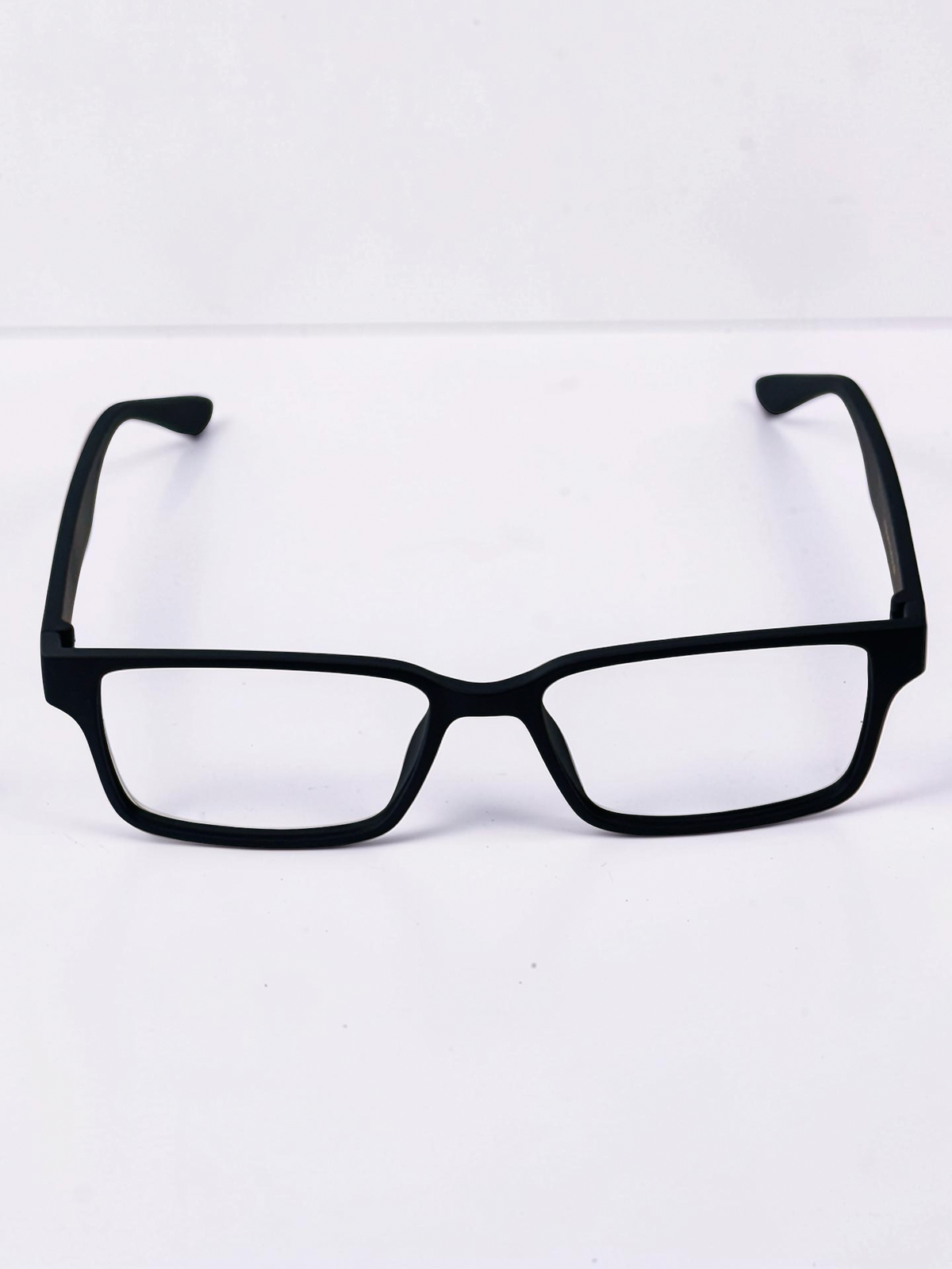Black clip-on frame shown from the back