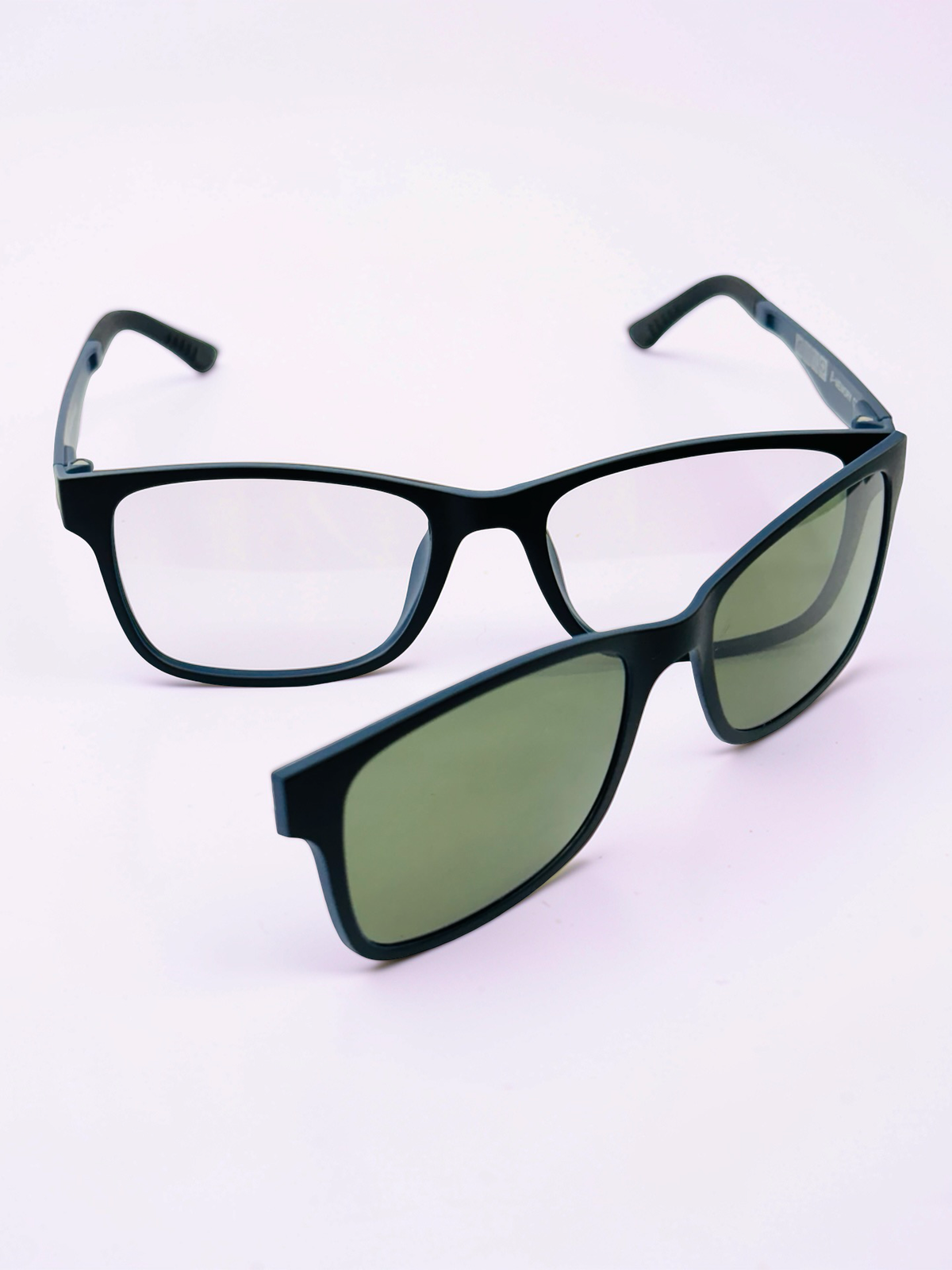 Black rectangle clip-on glasses with green polarized sun lenses, front view