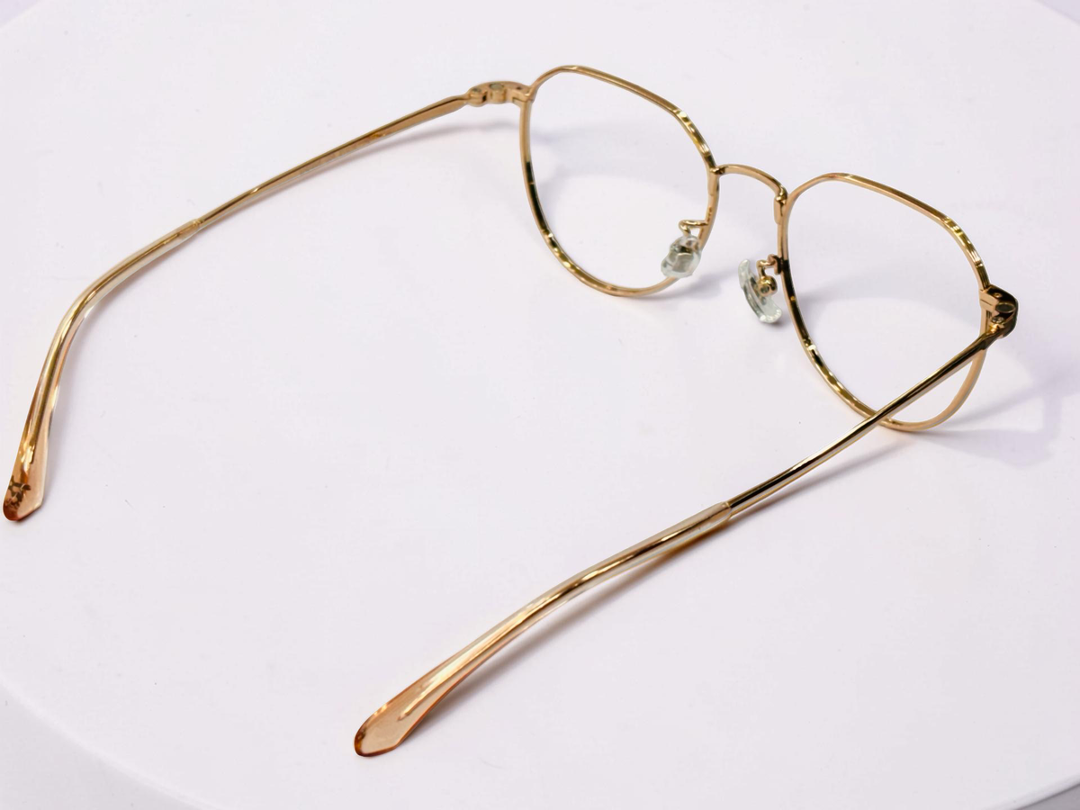 Clip-on frame with yellow and dark detachable sun clips attached
