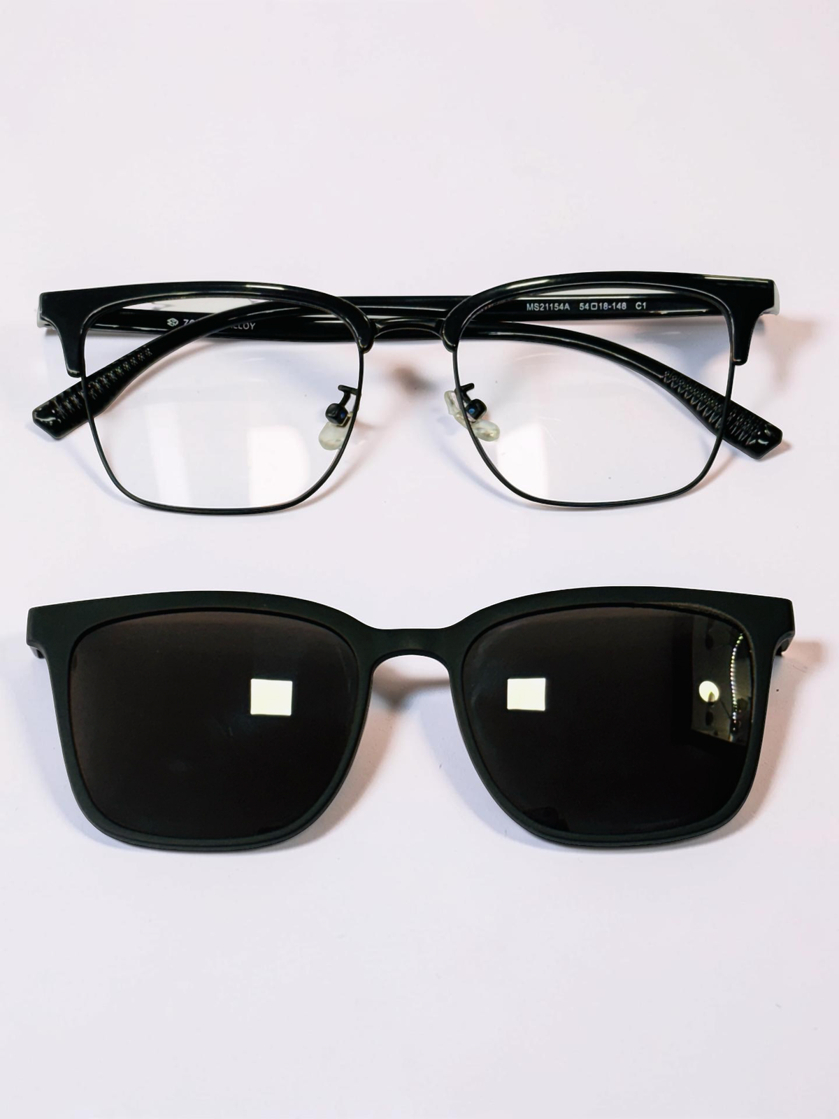 Black optical frame and clip-on shown from the front